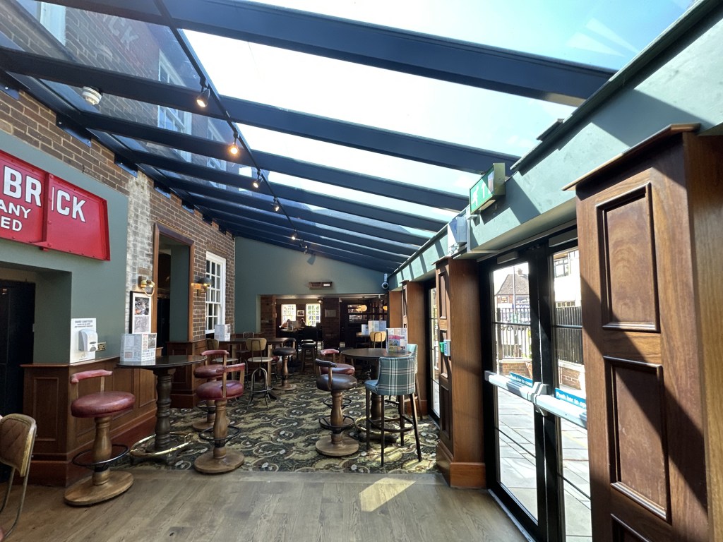 Interior of conservatory of Captain Ridley's Hunting Party Wetherspoon in Bletchley, Milton Keynes 