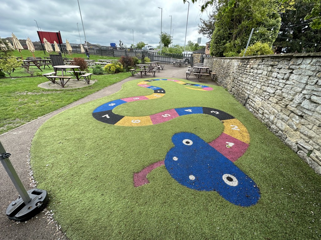 There's a small play area for children in the beer garden with a numbered snake.