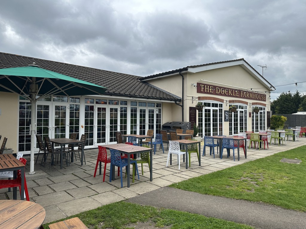 The Dockle Farmhouse in Swindon has a huge beer garden, with ample seating and bright patio doors.