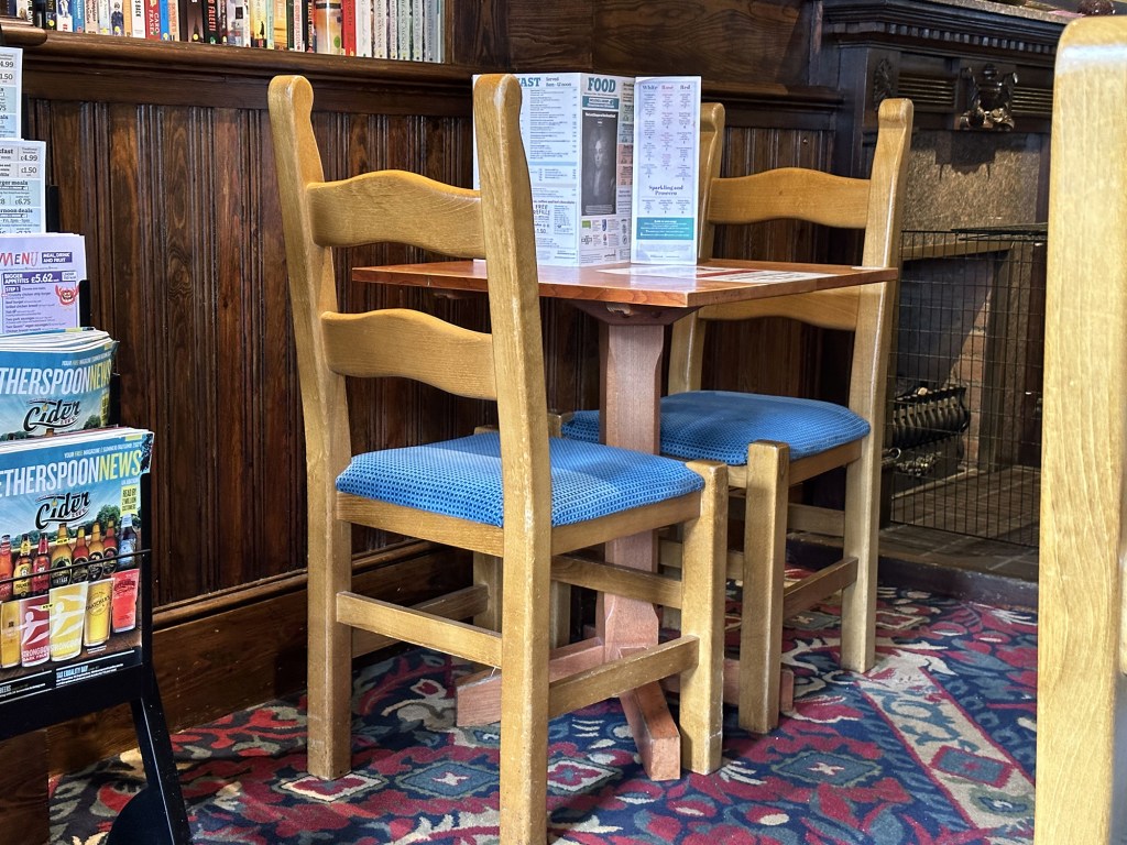 Heavy oak chairs at The Lord Keeper of the Great Seal 